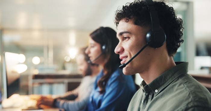 Young man in a call center